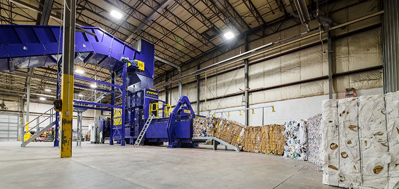Presona baler with conveyor