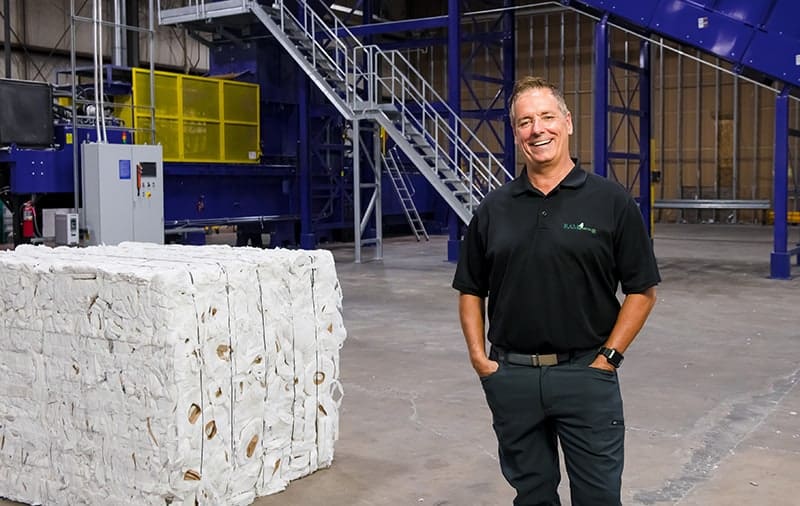 Tony Duckert by his baler